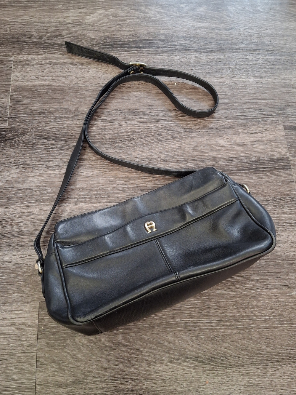 Aigner Black Leather Shoulder Bag with Gold Accent Charm Soft Adjustable Strap